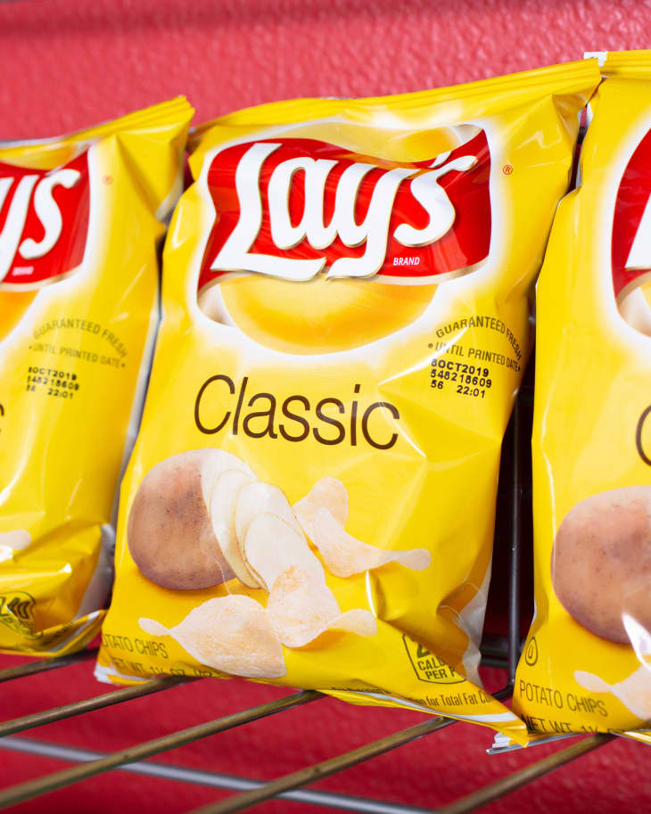 Los Angeles, California, United States - 09-04-2019: A view of several small bags of Lays Classic Potato Chips on shelf at a convenient store.
