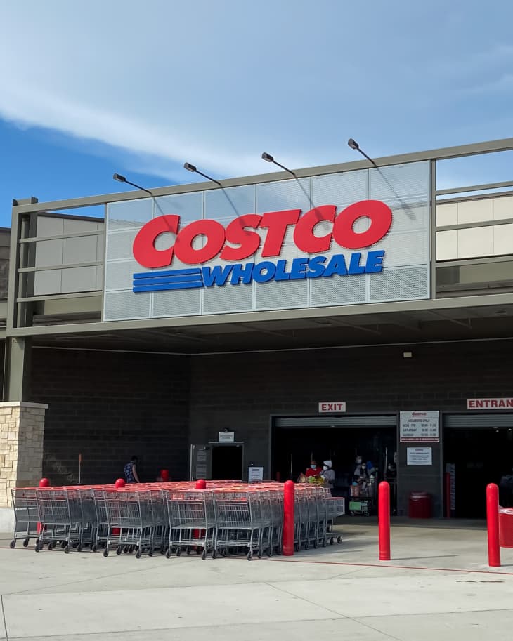 Mckinney, TX / USA - August 12, 2020: Costco Wholesale Entrance with shopping carts and customers in a sunny day