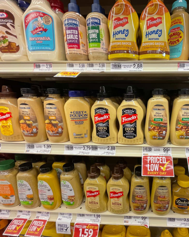 Retail store dijon mustard section and prices