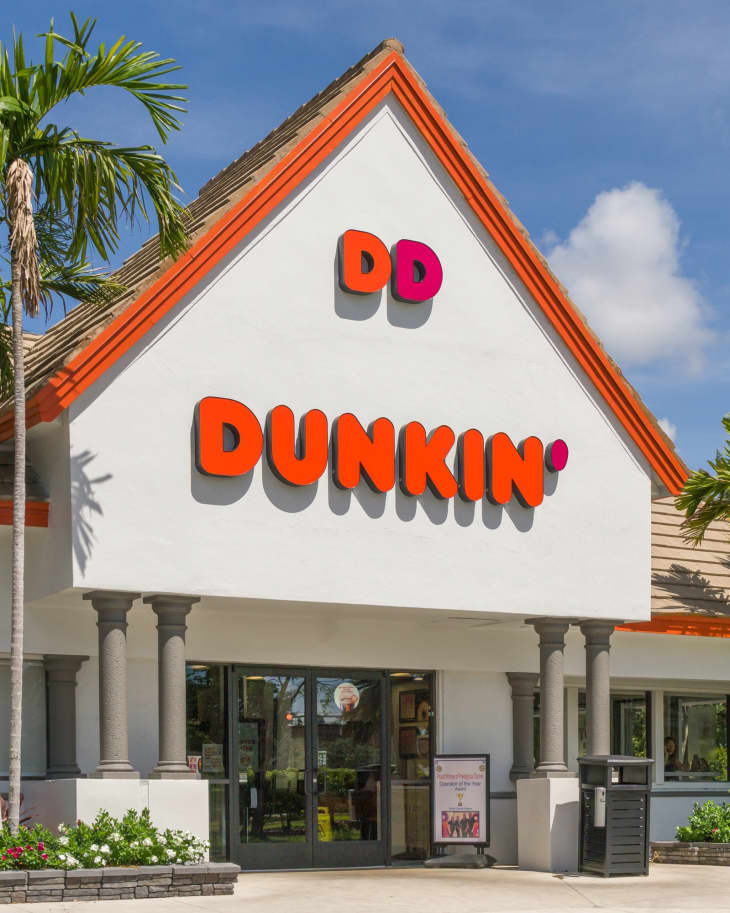DAVIE, FL, USA - JULY 1, 2022: Dunkin' Donuts restaurant exterior and trademark logo.