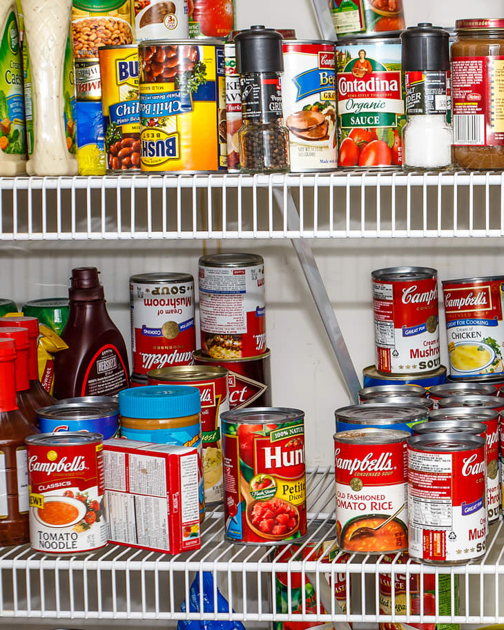 Pantry shelves with cans of food