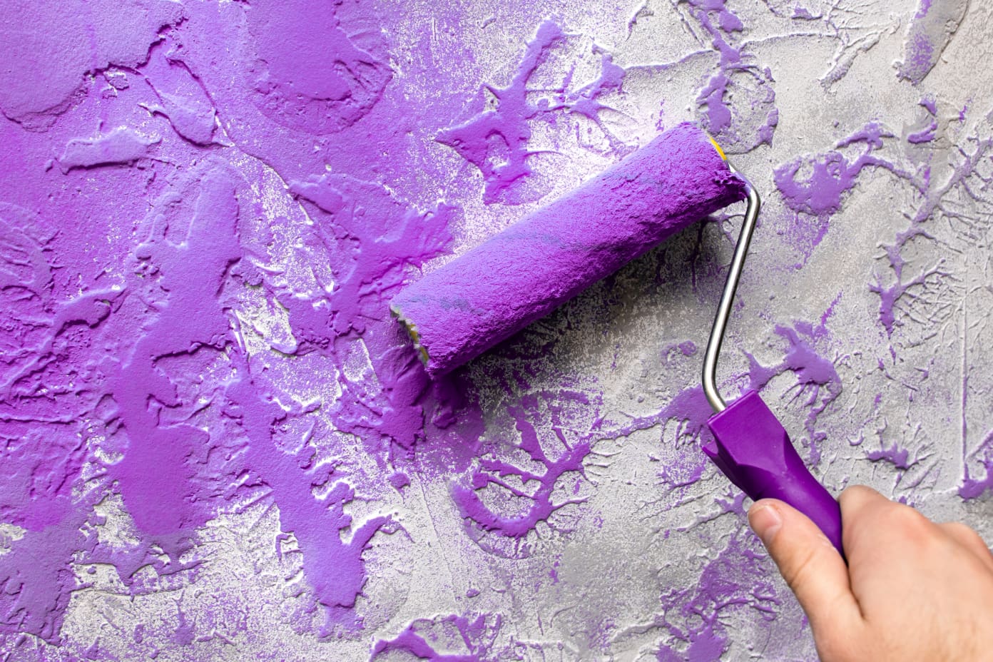 Sponge painting walls with a shop roller