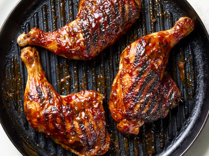 overhead shot of Tyler Florence's BBQ chicken legs on a grill pan