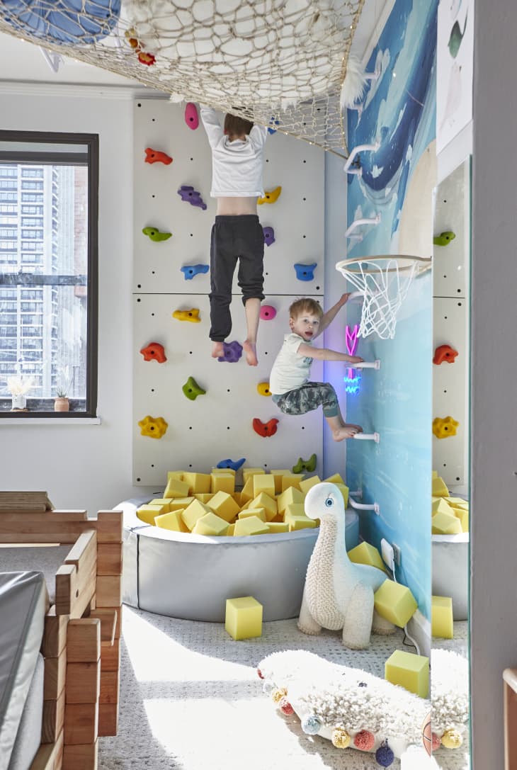 Kids playing on at home jungle gym.