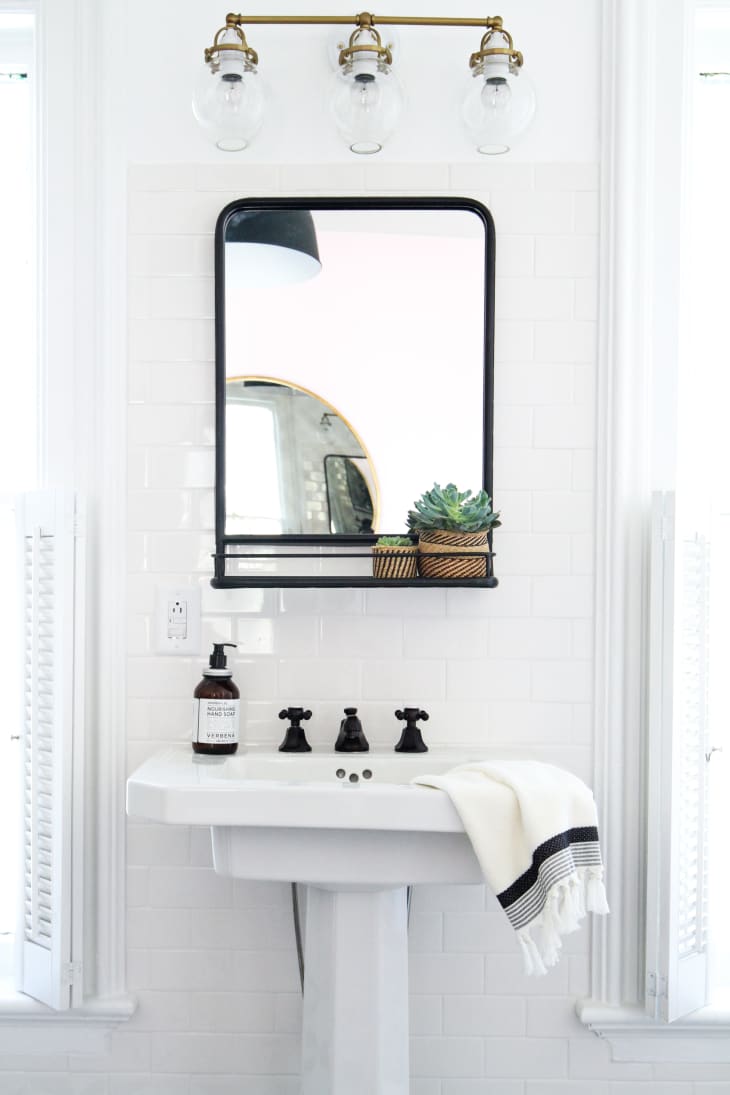 How do I mount a few shelves on a bathroom mirror?