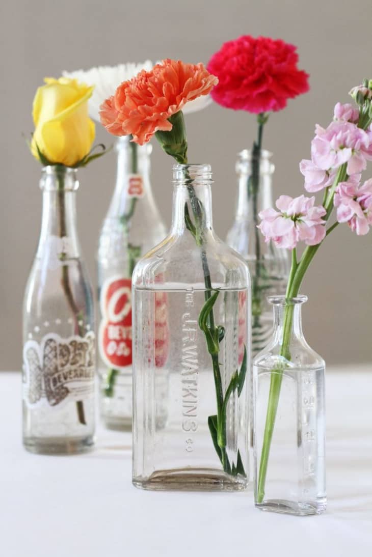 flowers in glass bottles