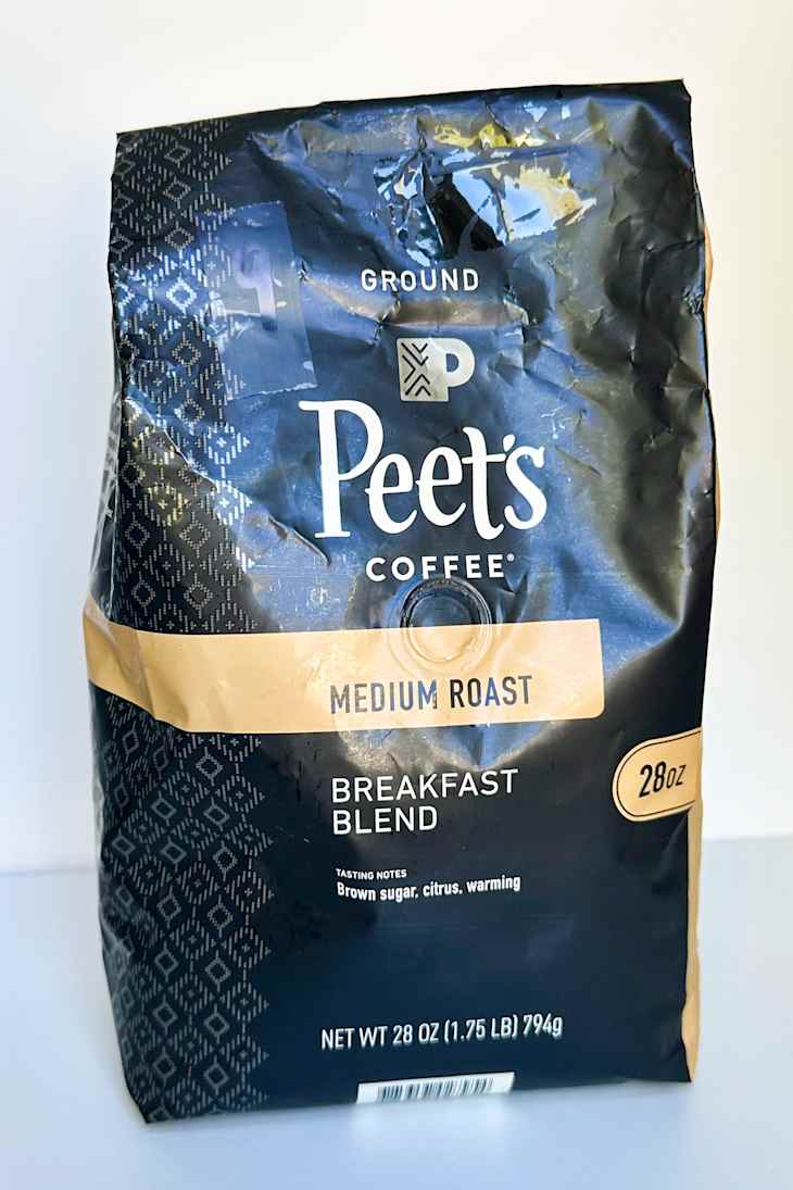 Ground coffee bag featuring Peet's Coffee, labeled as Medium Roast Breakfast Blend, with tasting notes.