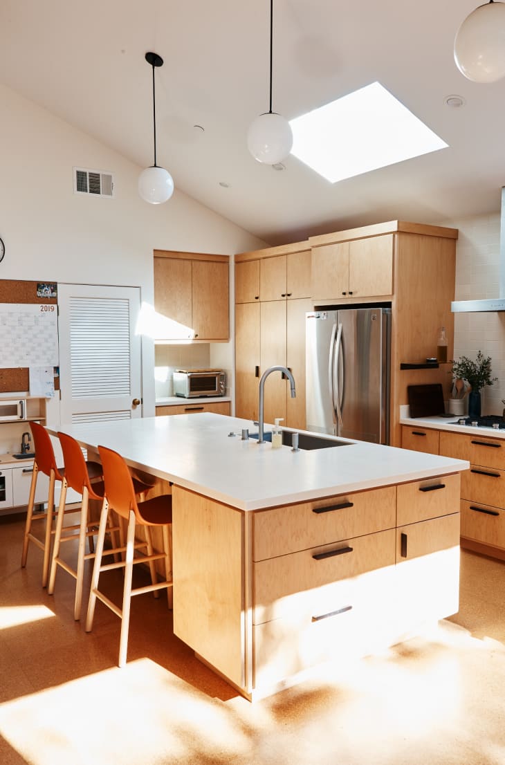 The kitchen of Polly and Andrew with a Schoolhouse big wall calendar displayed