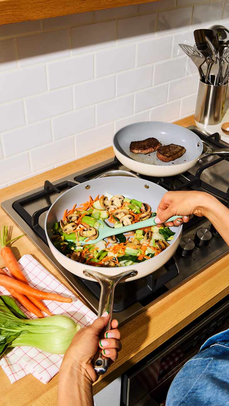 Someone cooking hello fresh food with a caraway skillet