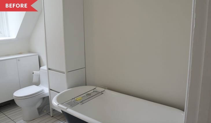 Before: bathroom with white walls, white built-ins, and a clawfoot tub