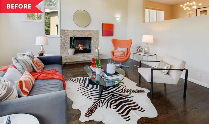 Before: Living room with zebra rug and pops of orange