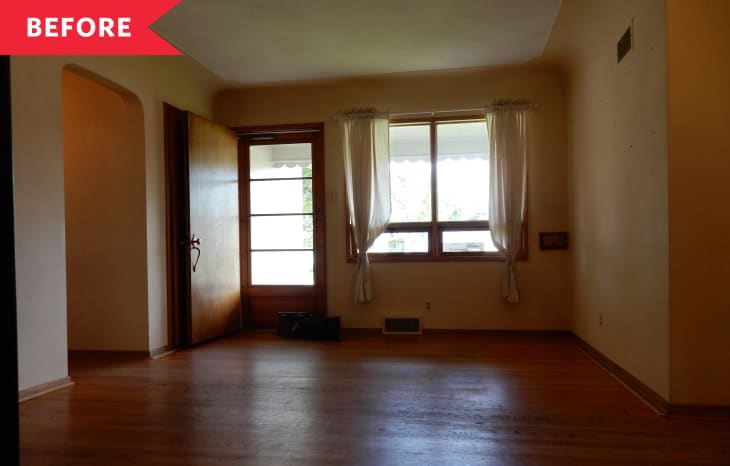 Before: Empty living room with wood floors and beige walls