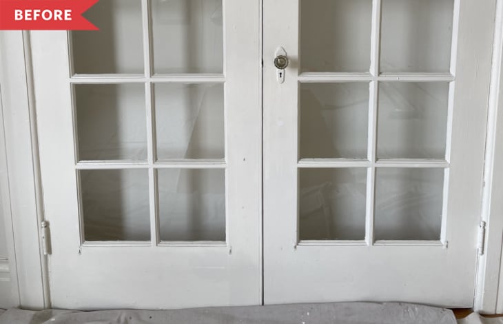 Before: French doors painted white leading into an empty tiny nook.