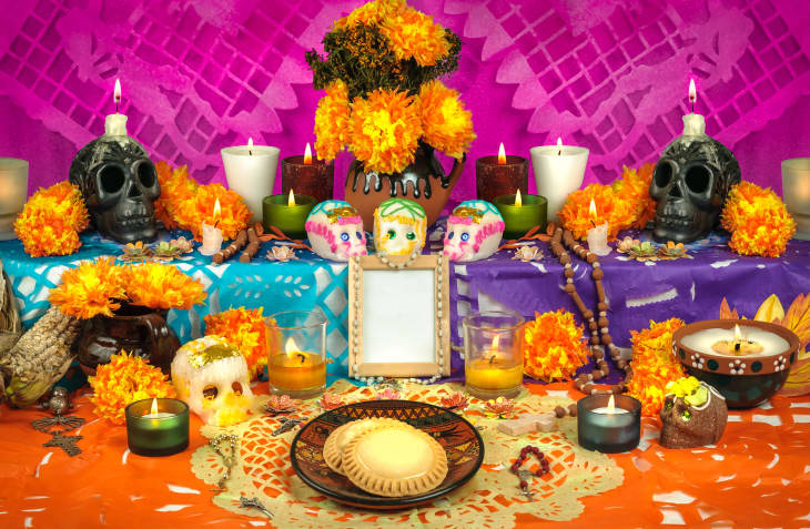 Day of the dead altar with sugar skulls