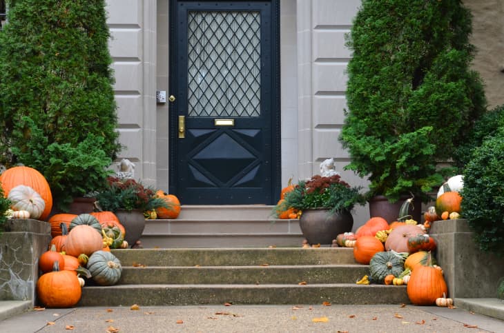 Porch decorated with pumkins for fall