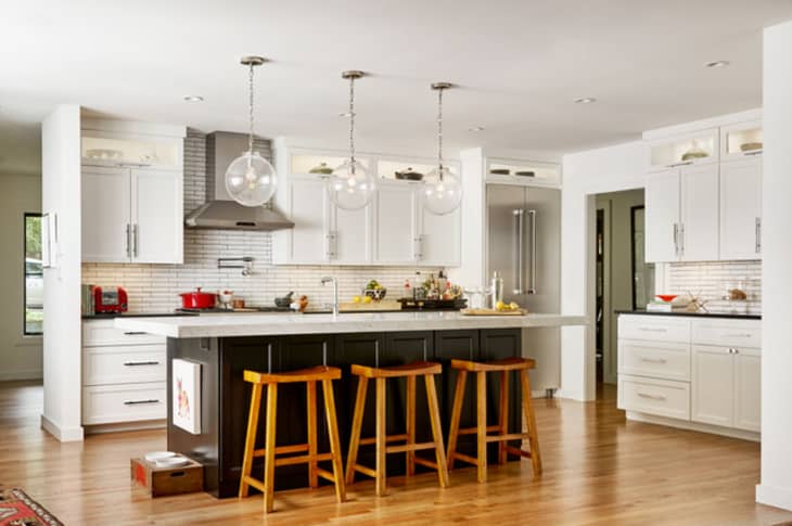 Kitchen with dog bowls at end of island