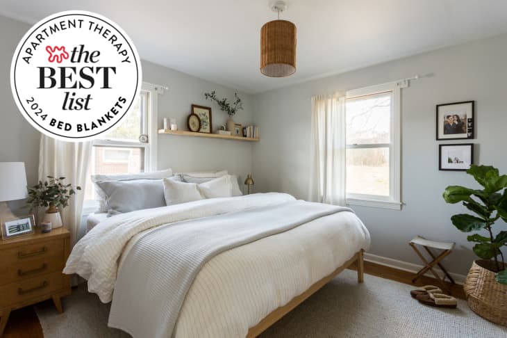 Image of bedroom done in pale grays and white. Seal for Apartment Therapy's Best List 2024: Bed Blankets in upper left corner
