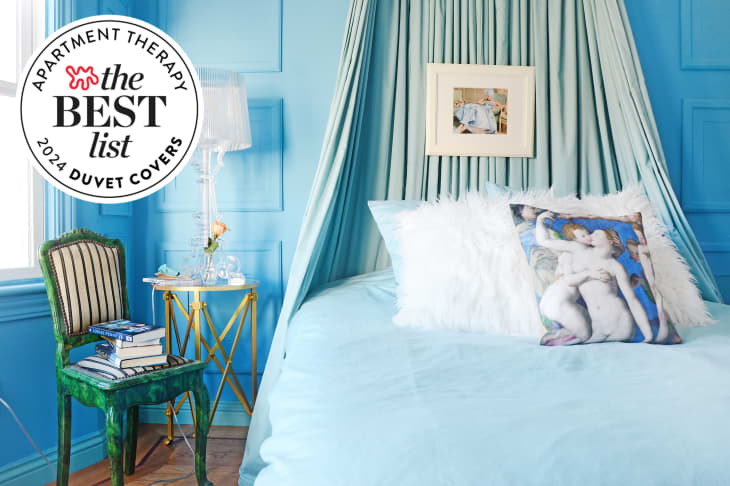 Photo of blue bedroom with bed with blue duvet. Seal in upper left corner reads "Apartment Therapy The Best List: 2024 Duvet Covers"
