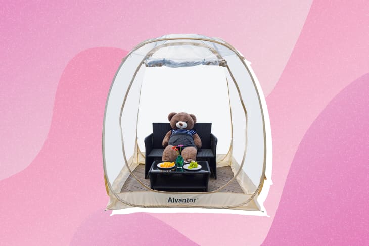 Outdoor bubble tent with teddy bear sitting inside