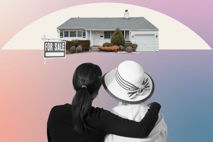 mother and daughter looking at their home, now for sale