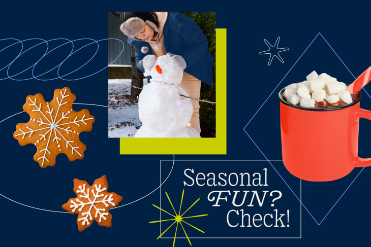 Person building a snowman, gingerbread cookies, and a red mug of hot chocolate with marshmallows on a festive background.