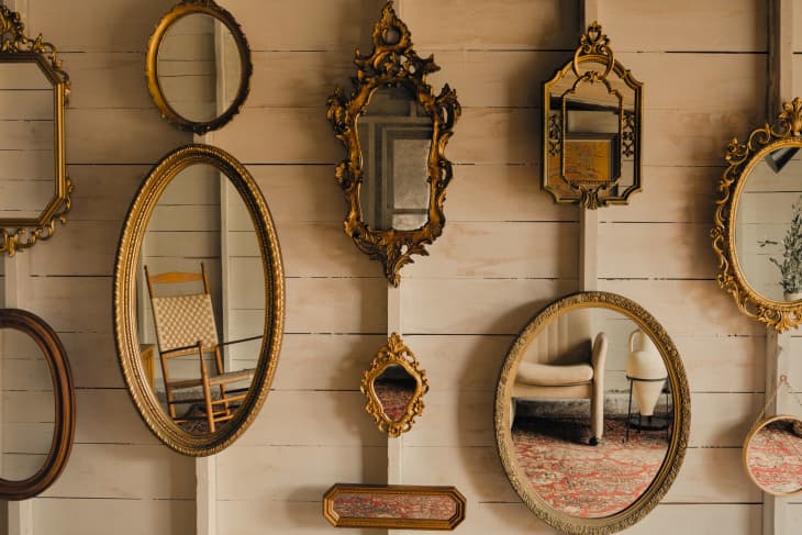 Gallery wall of antique mirrors