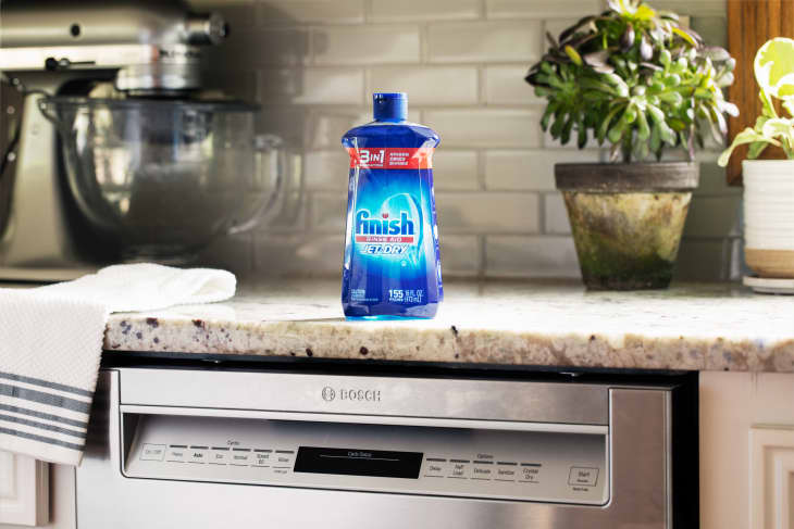Rinse aid on the kitchen counter above dishwasher