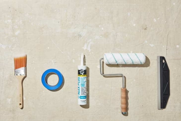 Painting supplies on drop cloth