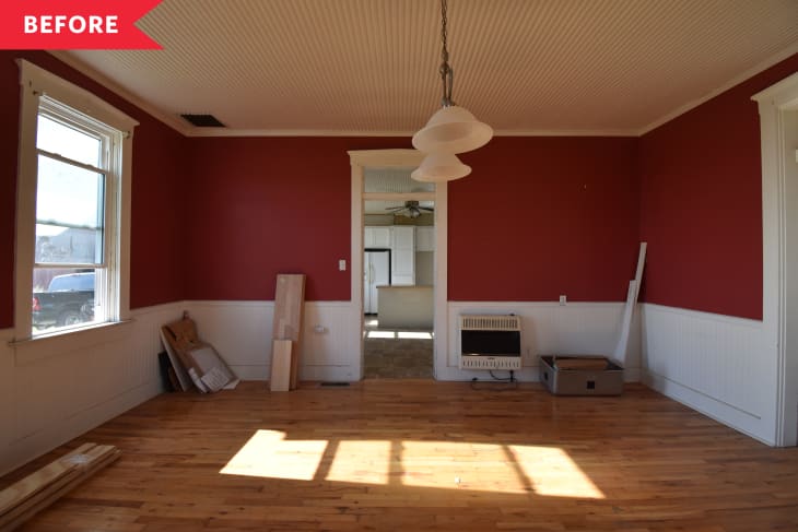 Before: Dark living room with red walls and white beadboard