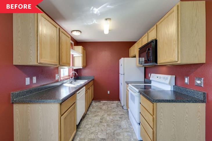 Before: Galley kitchen with red walls and yellowy oak cabinets