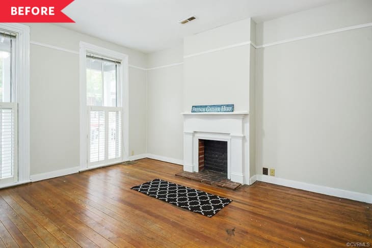 Before: Empty room with fireplace