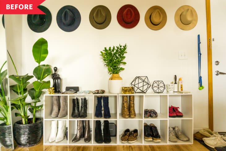 Before: White Mainstay cube shoe storage with hats hanging above