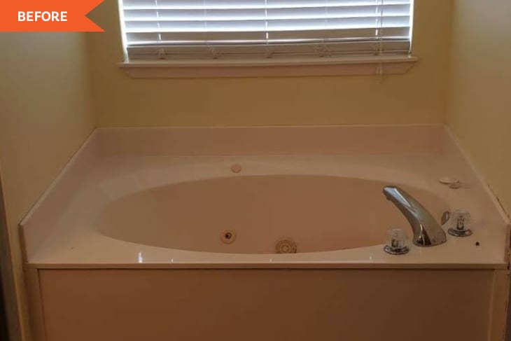 Before: Bathroom with tan bathtub against yellow walls