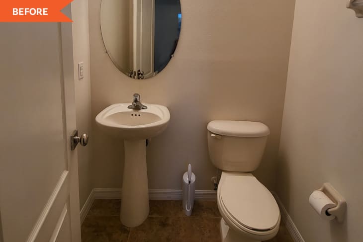 Small bathroom with pedestal sink, oval mirror, toilet, and beige walls.