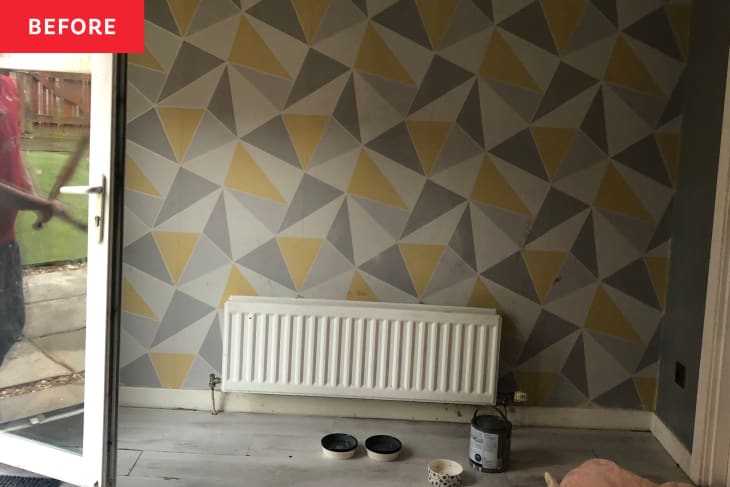 Before: Empty dining room with patterned wallpaper and radiator