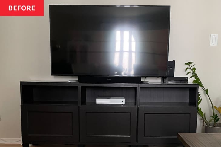 Before: a tv on a black cabinet