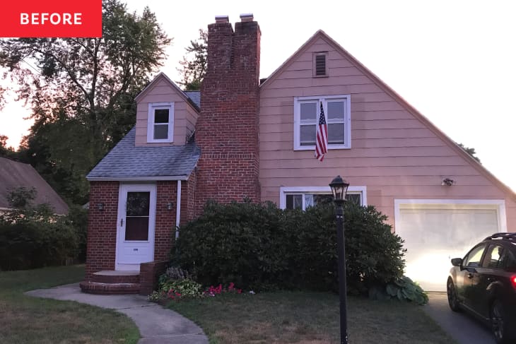 Exterior of a brown/tan house, before renovation and repainting