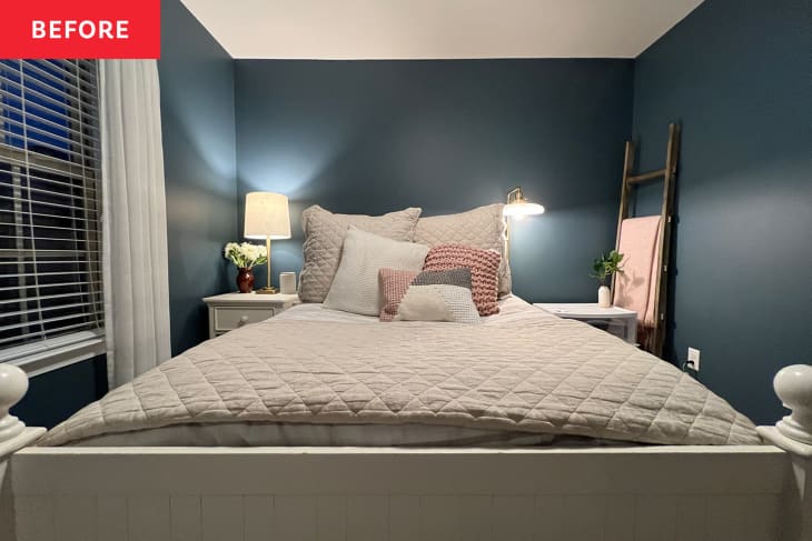 Bedroom with blue painted walls and tan colored bedding before renovation.