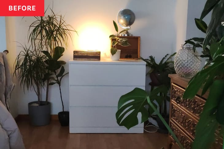white cabinet in corner of the room, before makeover
