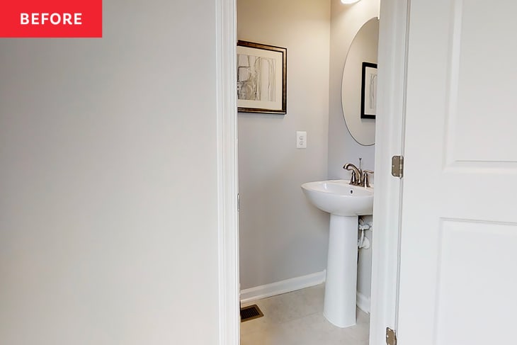 White and grey bathroom before renovation.