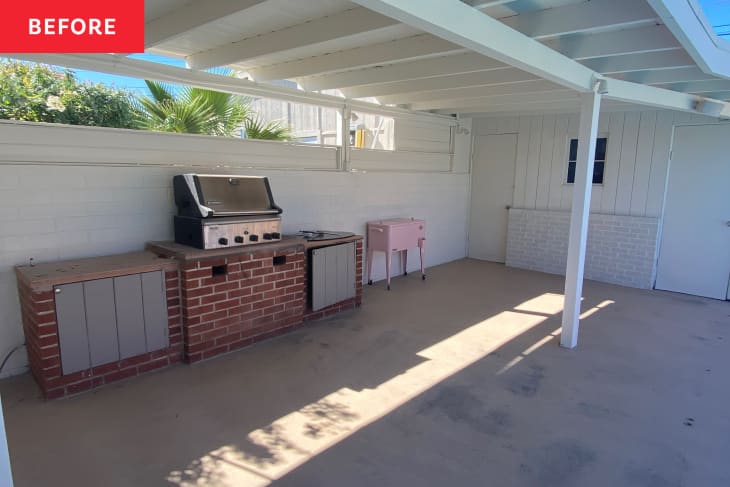 Brick barbecue area in back yard before renovation.