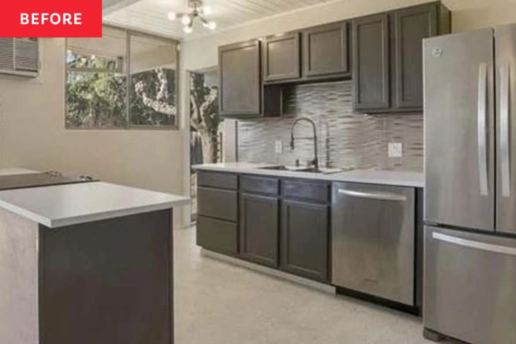 kitchen before renovation. Gray cabinets, linoleum floor