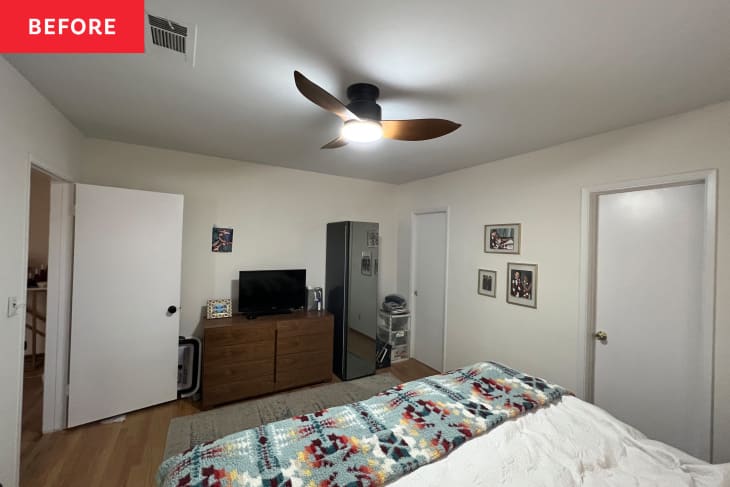 White bedroom with ceiling fan before renovation.
