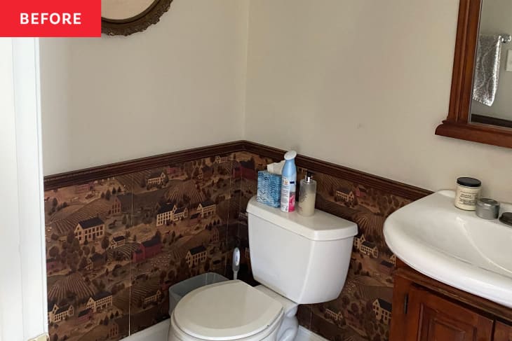 Bathroom with wallpaper wainscoting before renovation.