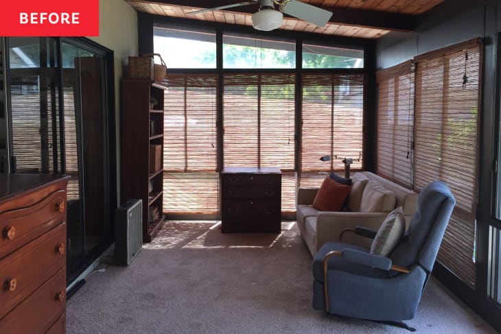 A carpeted sunroom.