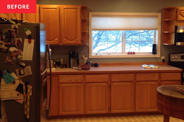 Wooden cabinets in kitchen before.