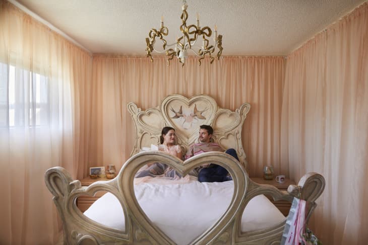 couple sitting on their bed