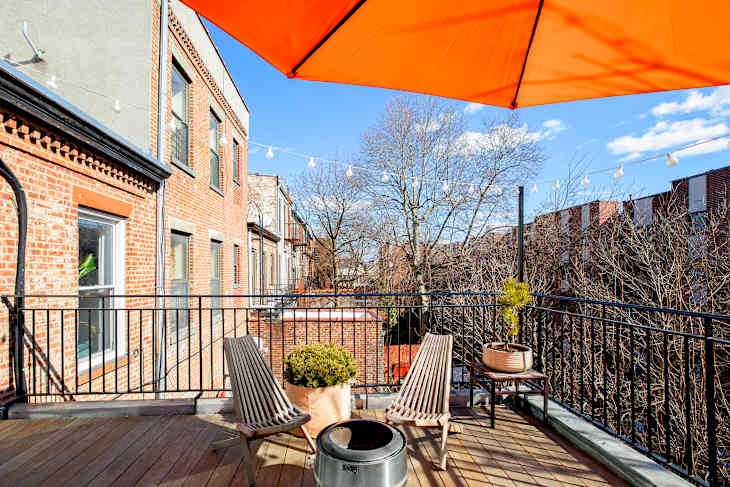 Chairs and plants on exterior deck