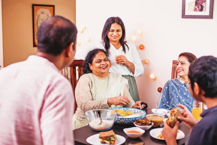 Happy Indian family having a festive Diwali dinner together