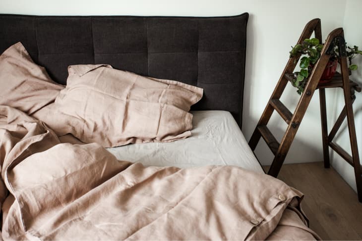 Beige linen bed sheets in the bedroom